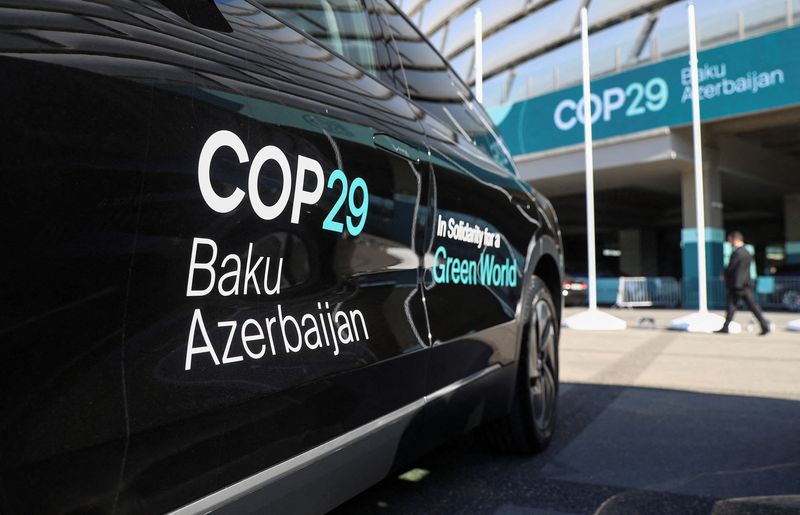 © Reuters. FILE PHOTO: A car is parked at the venue of the United Nations climate change conference, known as COP29, during a media tour ahead of the summit beginning in Baku, Azerbaijan November 8, 2024. REUTERS/Aziz Karimov/File Photo