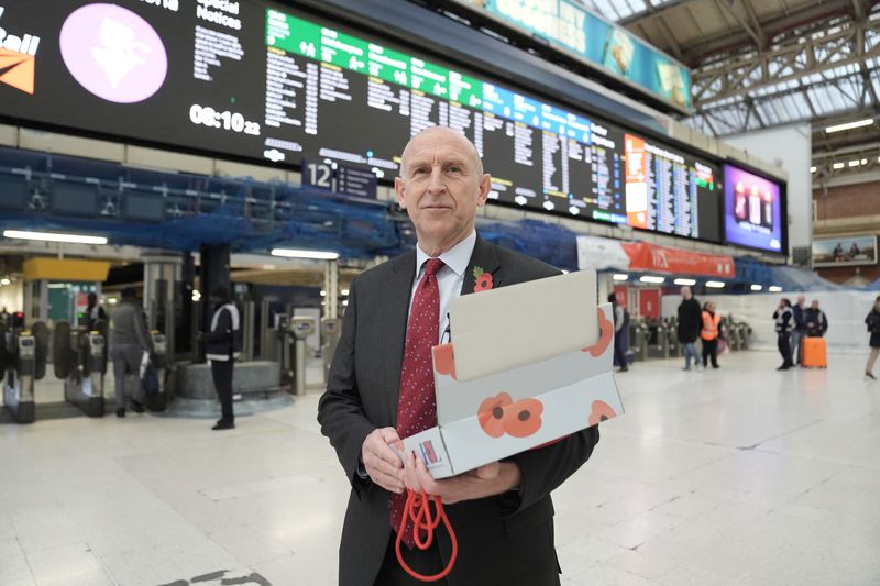 &copy; Reuters. FILE PHOTO: Britain's Defence Secretary John Healey joins serving military personnel to hand out poppies and collect donations for the Royal British Legion Appeal during London Poppy Day, at Victoria Station, London, Britain. Picture date: Thursday Octobe