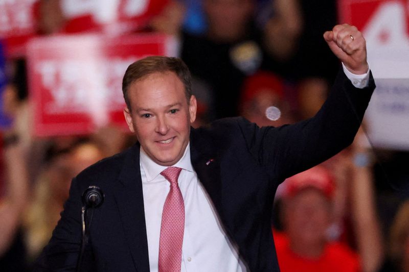 © Reuters. FILE PHOTO: Former U.S. Rep. Lee Zeldin gestures at the Nassau Veterans Memorial Coliseum during a rally held by Republican presidential nominees and former U.S. President Donald Trump, in Uniondale, New York, U.S., September 18, 2024. REUTERS/Brendan McDermid/File Photo