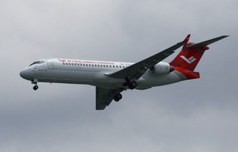 &copy; Reuters. FILE PHOTO: A Comac ARJ21 flies during the aerial display at the Singapore Airshow at Changi Exhibition Centre in Singapore February 22, 2024. REUTERS/Edgar Su/File Photo