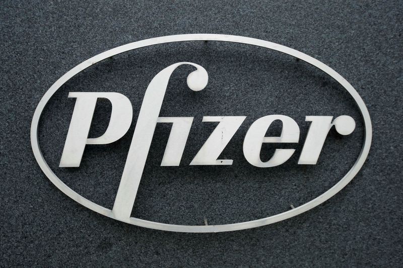 &copy; Reuters. FILE PHOTO: The Pfizer logo is seen at their UK commercial headquarters in Walton Oaks, Britain, February 1, 2021. REUTERS/Matthew Childs/File Photo