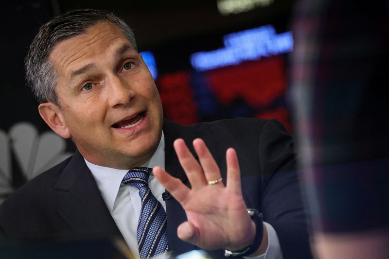 © Reuters. FILE PHOTO: Tom Michaud, CEO of Keefe, Bruyette & Woods, (KBW) speaks during an interview with CNBC on the floor of the New York Stock Exchange (NYSE) in New York City, U.S., May 4, 2023.  REUTERS/Brendan McDermid/File Photo