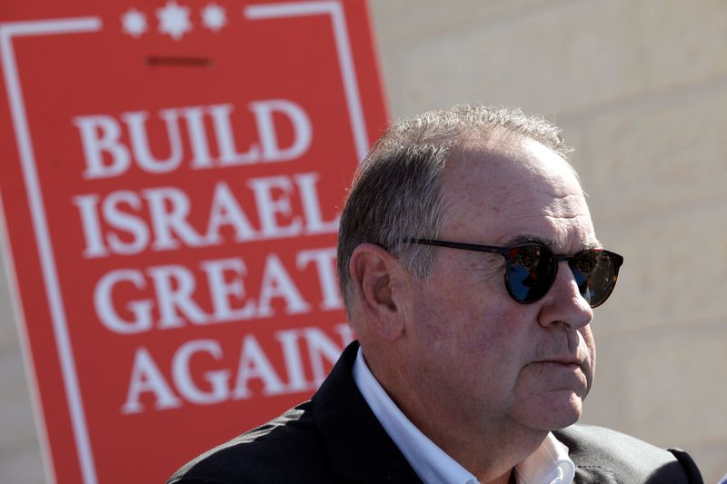 &copy; Reuters. FILE PHOTO: Former Arkansas Governor Mike Huckabee attends a ceremony marking the construction of a new housing complex in the Israeli settlement of Efrat in the occupied West Bank August 1, 2018. REUTERS/Amir Cohen/File Photo