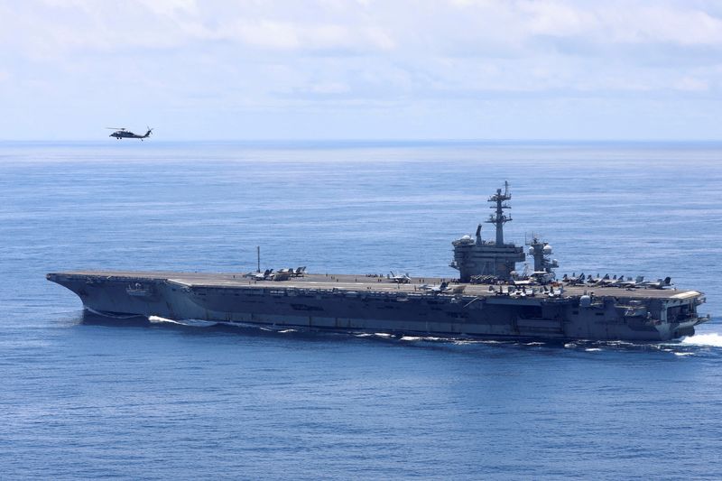 © Reuters. FILE PHOTO: The USS George Washington aircraft carrier sails in Pacific Ocean waters during the Southern Seas tactical and operational support naval exercises in Buenaventura, Colombia June 29, 2024. REUTERS/Luisa Gonzalez/File Photo