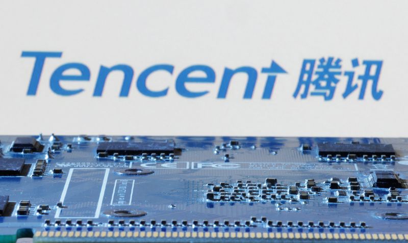 © Reuters. FILE PHOTO: Tencent logo is seen near computer motherboard in this illustration taken January 8, 2024. REUTERS/Dado Ruvic/Illustration/File Photo