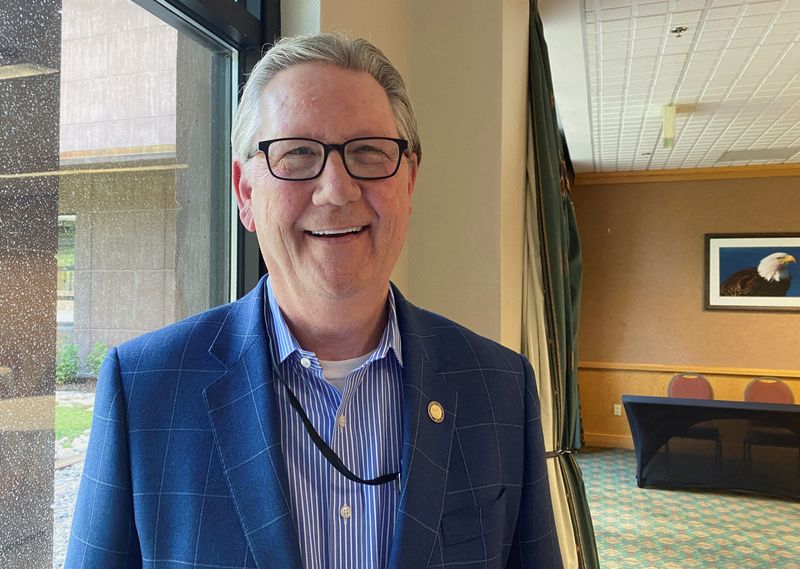 © Reuters. FILE PHOTO: Federal Reserve Bank of Kansas City President Jeffrey Schmid poses at the Jackson Lake Lodge in Jackson Hole, Wyoming, U.S., where the Kansas City Fed holds its annual economic symposium, August 24, 2023. REUTERS/Ann Saphir/File Photo