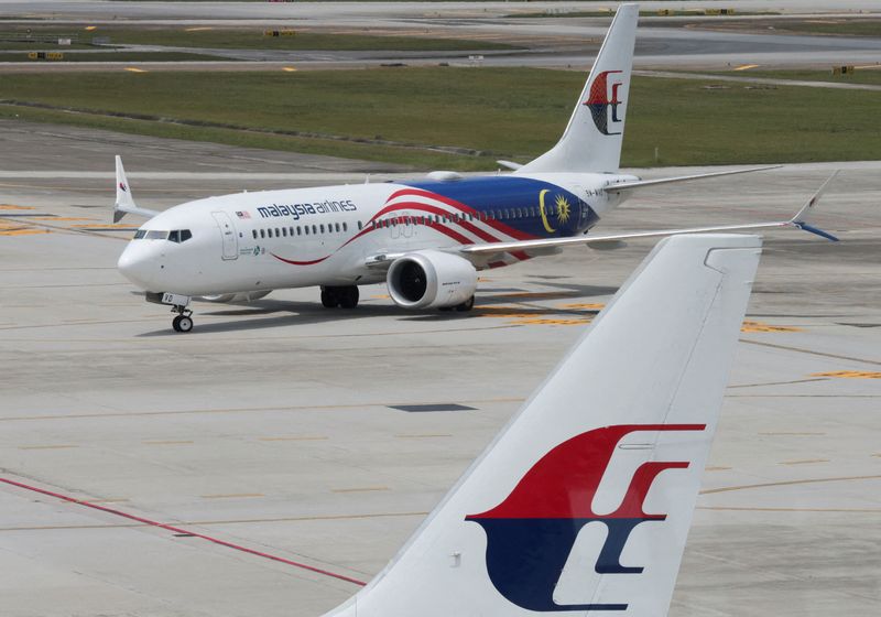 © Reuters. FILE PHOTO: Malaysia Airlines planes are seen on the tarmac of Kuala Lumpur International Airport at Sepang, Malaysia August 28, 2024. REUTERS/Hasnoor Hussain/File Photo