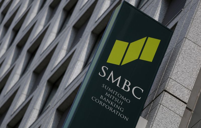 &copy; Reuters. FILE PHOTO: A sign board of Sumitomo Mitsui Banking Corporation is seen outside its branch in Tokyo July 30, 2014. REUTERS/Yuya Shino/File Photo