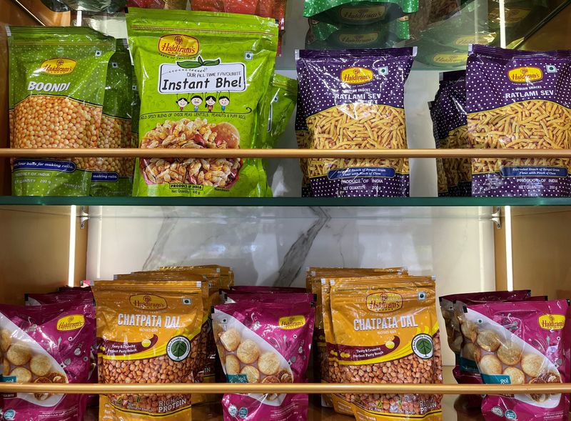  A view shows packets of snacks on the shelves inside a Haldiram's restaurant in Mumbai, India, September 6, 2023. REUTERS/M. Sriram/File Photo