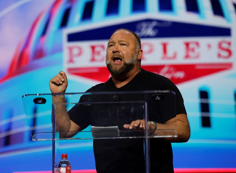  Far-right radio host Alex Jones speaks at an event held by the national conservative political movement, 'Turning Point' in Detroit, Michigan, U.S., June,  16, 2024. REUTERS/Rebecca cook/File Photo