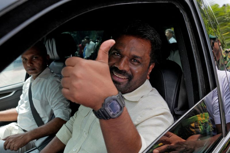 &copy; Reuters. Sri Lanka's President and National People's Power (NPP) party leader Anura Kumara Dissanayake gestures as he leaves after casting his vote on the day of the parliamentary election in Colombo, Sri Lanka, November 14, 2024. REUTERS/Thilina Kaluthotage 