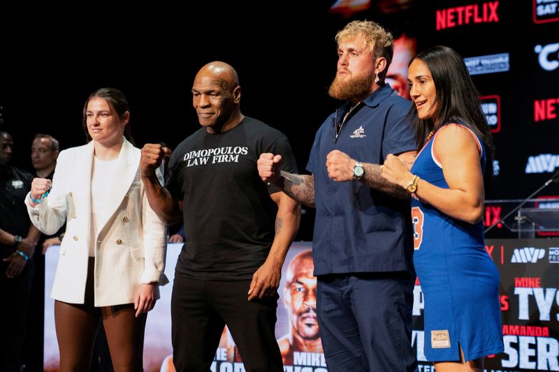 © Reuters. FILE PHOTO: Boxers Mike Tyson, Jake Paul, Katie Taylor, and Amanda Serrano attend a news conference, ahead of their postponed professional fight which was set to take place at AT&T Stadium in Arlington, Texas on July 20, in New York City, U.S., May 13, 2024. REUTERS/David 'Dee' Delgado/File Photo