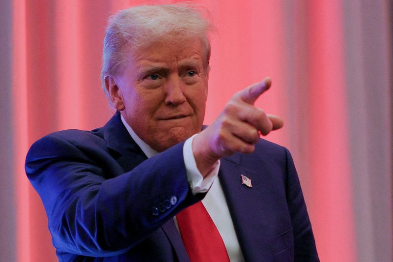 © Reuters. FILE PHOTO: U.S. President-elect Donald Trump gestures as he meets with House Republicans on Capitol Hill in Washington, U.S., November 13, 2024. REUTERS/Brian Snyder/File Photo