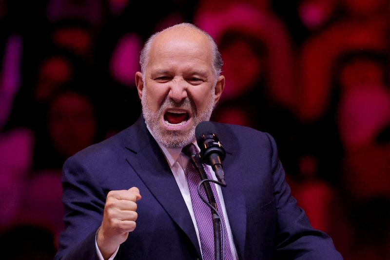 &copy; Reuters. FILE PHOTO: Howard Lutnick, Chairman and CEO of Cantor Fitzgerald, gestures as he speaks during a rally for Republican presidential nominee and former U.S. President Donald Trump at Madison Square Garden, in New York, U.S., October 27, 2024. REUTERS/Andre