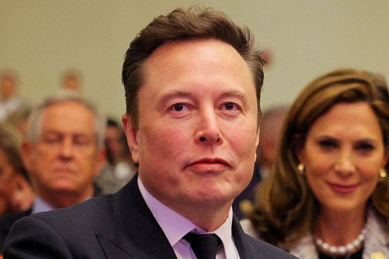 &copy; Reuters. FILE PHOTO: Tesla CEO and X owner Elon Musk sits as U.S. President-elect Donald Trump meets with House Republicans on Capitol Hill in Washington, U.S., November 13, 2024. REUTERS/Brian Snyder/File Photo