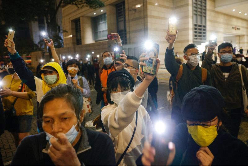 &copy; Reuters. FILE PHOTO: Supporters of 47 pro-democracy activists, Hong Kong, March 5, 2021. REUTERS/Tyrone Siu