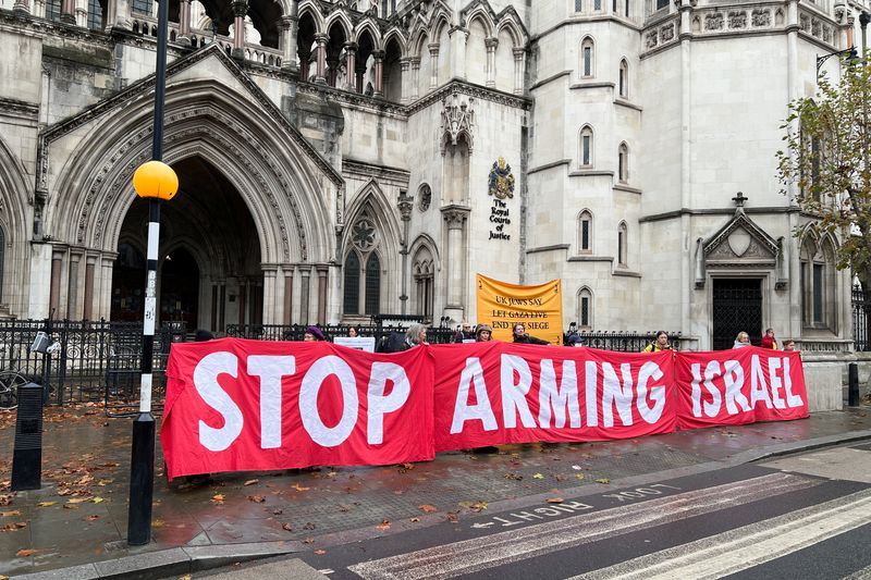 &copy; Reuters. Protesters demonstrate outside the Royal Courts of Justice ahead of a legal challenge brought by the Palestinian NGO Al-Haq over Britain's exports of parts for F-35 fighter jets to Israel, amid its conflict with Hamas, in London, Britain, November 18, 202