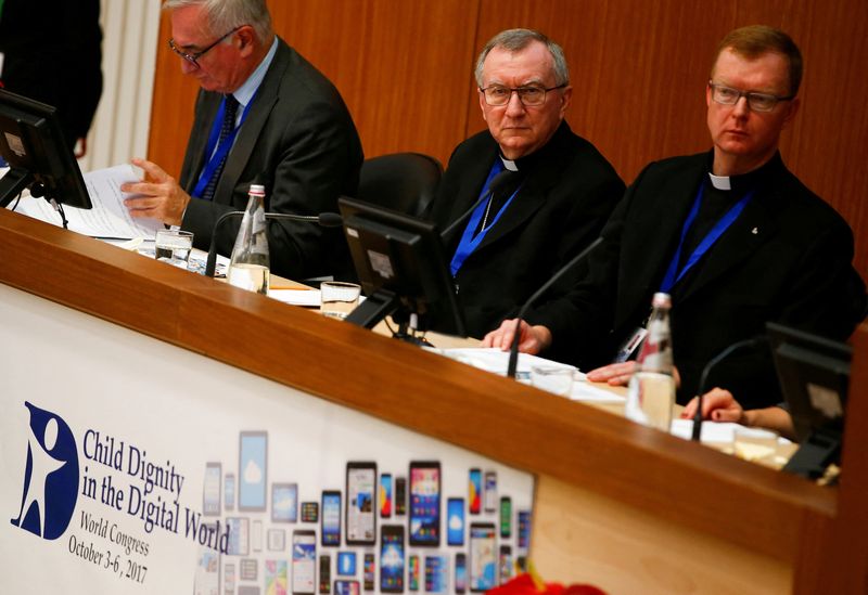 &copy; Reuters. FILE PHOTO: Father Hans Zollner (R), President of the Centre for Child Protection, attend the World Congress "Child Dignity in the Digital World" at the Pontifical Gregorian University in Rome, Italy October 3, 2017. REUTERS/Tony Gentile/File Photo