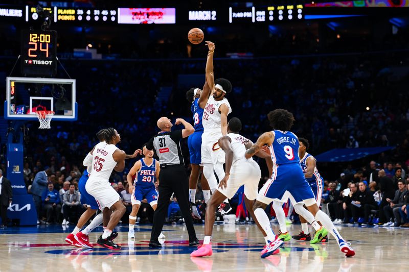 © Reuters. FILE PHOTO: Nov 13, 2024; Philadelphia, Pennsylvania, USA; Cleveland Cavaliers center Jarrett Allen (31) and Philadelphia 76ers forward Guerschon Yabusele (28) battle for the tip-off in the first quarter at Wells Fargo Center. Mandatory Credit: Kyle Ross-Imagn Images/File Photo