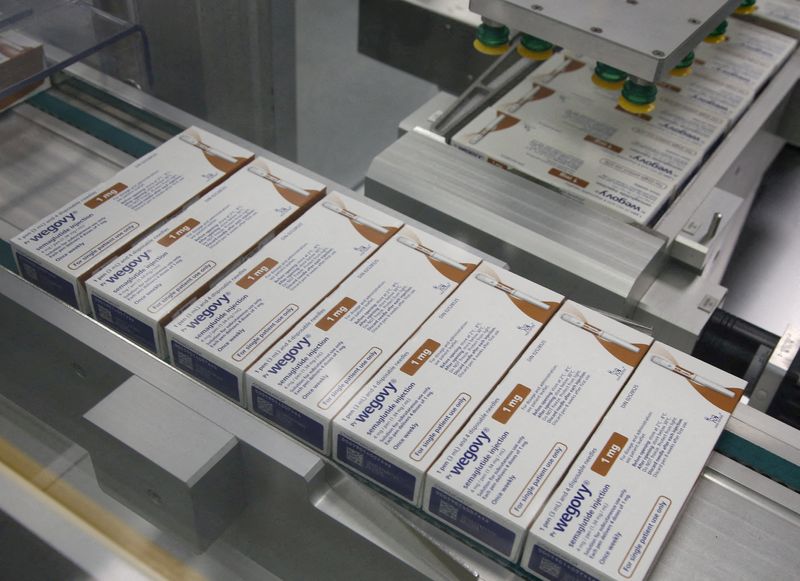 © Reuters. FILE PHOTO: Boxes of Wegovy move along a packaging line at Novo Nordisk's facility in Hillerod, Denmark, March 8, 2024. REUTERS/Tom Little//File Photo