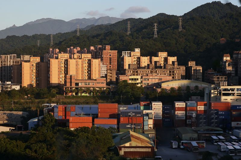 &copy; Reuters. A container yard is seen during sunset hours in Keelung, Taiwan, November 18, 2020. REUTERS/Ann Wang/File Photo