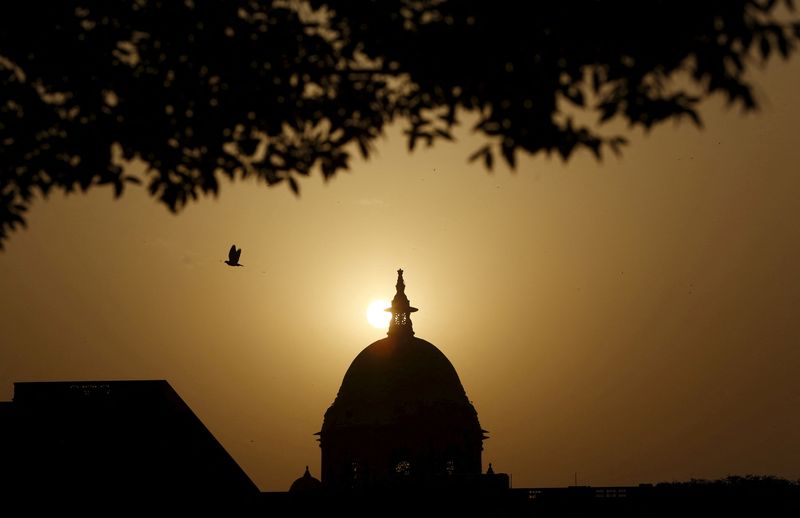 © Reuters. FILE PHOTO: India's Ministry of Finance building is silhouetted against the setting sun in New Delhi April 2, 2015. REUTERS/Adnan Abidi/File Photo/File Photo