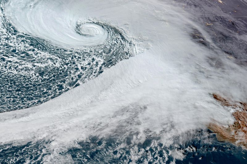 &copy; Reuters. A low pressure storm system known as a "bomb cyclone" forms off the coast of the U.S. Pacific Northwest and western Canada in a composite satellite image November 19, 2024.  CIRA/NOAA/Handout via REUTERS/File Photo