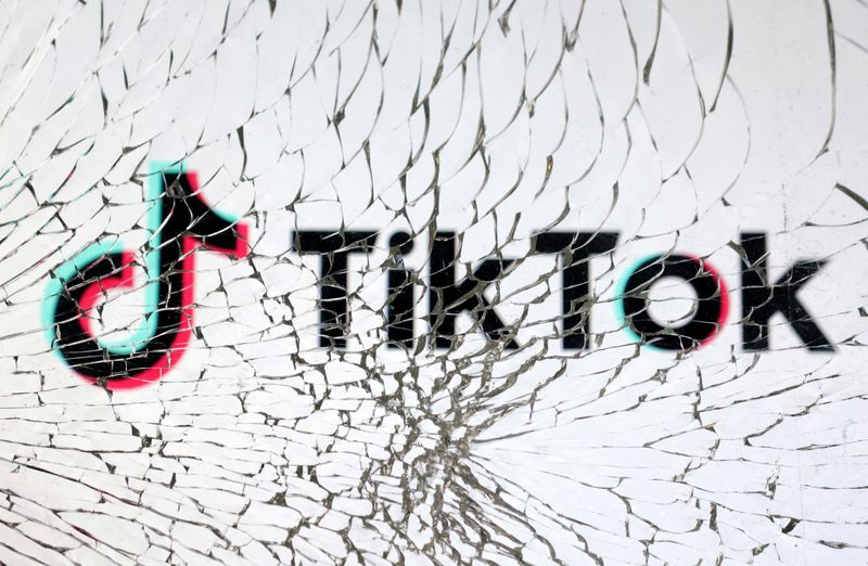 &copy; Reuters. FILE PHOTO: TikTok logo is seen through broken glass in this illustration taken, January 25, 2023. REUTERS/Dado Ruvic/Illustration/File Photo