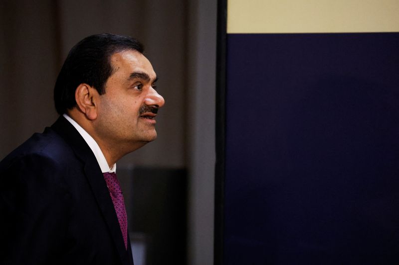 © Reuters. FILE PHOTO: Indian billionaire Gautam Adani speaks during an inauguration ceremony after the Adani Group completed the purchase of Haifa Port earlier in January 2023, in Haifa port, Israel January 31, 2023. REUTERS/Amir Cohen