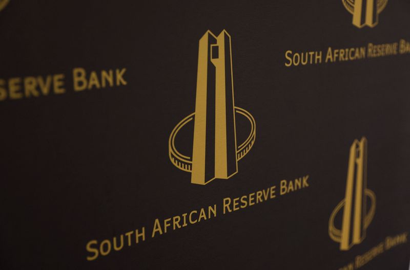 © Reuters. FILE PHOTO: The logo of South Africa's central reserve bank is seen during the delivery of a keynote address by South Africa's central bank governor, Lesetja Kganyago, at the University of the Witwatersrand in Johannesburg, South Africa, November 1, 2022. REUTERS/Siphiwe Sibeko/File photo