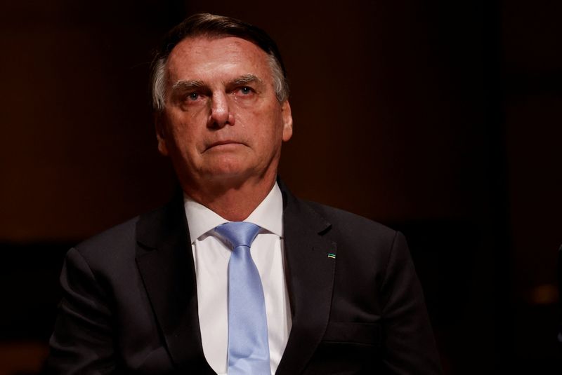 &copy; Reuters. FILE PHOTO: Brazil's former President Jair Bolsonaro reacts at an event at the Municipal Theatre in Sao Paulo, Brazil March 25, 2024. REUTERS/Amanda Perobelli/File Photo