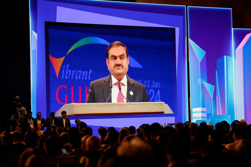 © Reuters. Chairperson of Adani Group Gautam Adani speaks during the Vibrant Gujarat Global Summit, at the Mahatma Mandir in Gandhinagar, Gujarat, India January 10, 2024. REUTERS/Amit Dave/File Photo