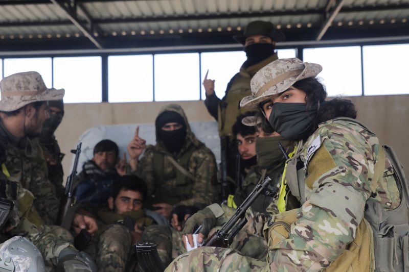 © Reuters. Rebel fighters, Homs countryside, Syria December 7, 2024. REUTERS/Mahmoud Hasano