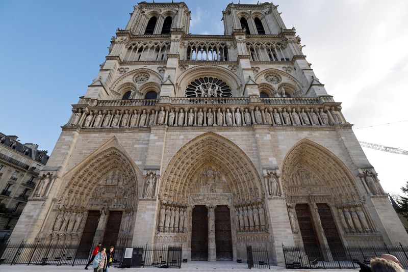 © Reuters. A photo shows the facade of the Notre-Dame de Paris cathedral, ahead of its official reopening ceremony after more than five years of reconstruction work following the April 2019 fire, in Paris, France on December 7, 2024.  LUDOVIC MARIN/Pool via REUTERS