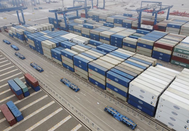 © Reuters. FILE PHOTO: A drone view shows containers at the new megaport being built by China's state-owned Cosco Shipping, promising to shorten sea routes to Asia for Peruvian and some Brazilian goods, in Chancay, Peru October 24, 2024. REUTERS/Angela Ponce/File Photo