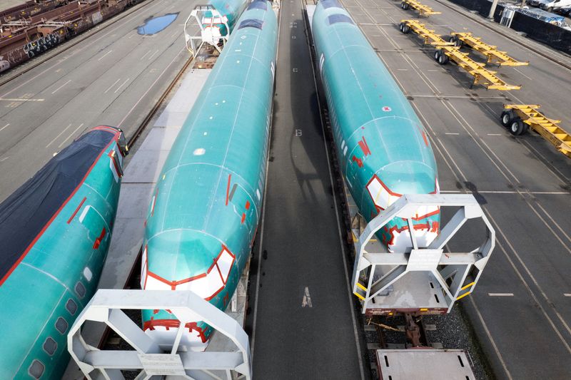 © Reuters. FILE PHOTO: A drone view shows Boeing 737 MAX fuselages atop rail cars at a train yard in Seattle, Washington, U.S., December 5, 2024. REUTERS/Matt Mills McKnight/File Photo