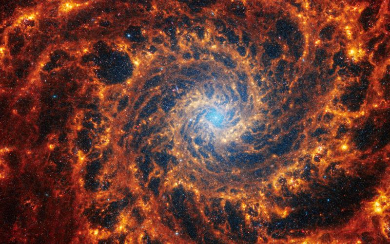 &copy; Reuters. A galáxia espiral NGC 628, localizada a 32 milhões de anos-luz de distância da Terra, em imagem sem data do Telescópio Espacial James WebbnNASA, ESA, CSA, STScI, Janice Lee (STScI), Thomas Williams (Oxford) e a equipe PHANGS/Divulgação via REUTERS