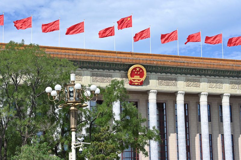 © Reuters. FILE PHOTO: A Chinese national flag flutters during the Forum on China-Africa Cooperation (FOCAC) summit at the Great Hall of the People in Beijing, China September 5, 2024.    ADEK BERRY/Pool via REUTERS/File photo