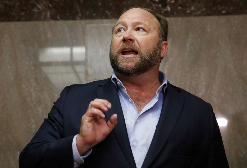 &copy; Reuters. FILE PHOTO: Alex Jones of Infowars talks to the media while visiting the U.S. Senate's Dirksen Senate office building as Twitter CEO Jack Dorsey testifies before a Senate Intelligence Committee hearing on Capitol Hill in Washington, U.S., September 5, 201