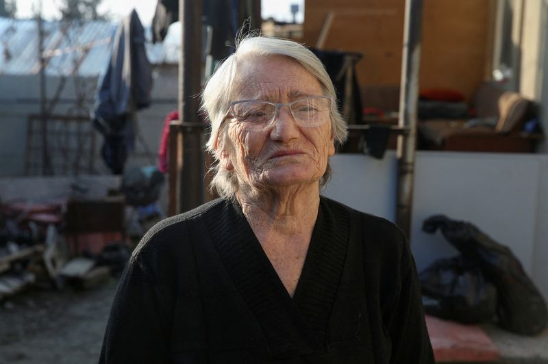 © Reuters. Marina Terishvili, whose son Giorgi was arrested following recent protests by the Georgian opposition against the government's decision to suspend negotiations on European Union membership, poses for a photo near her house in Tbilisi, in Georgia, December 10, 2024. REUTERS/Irakli Gedenidze