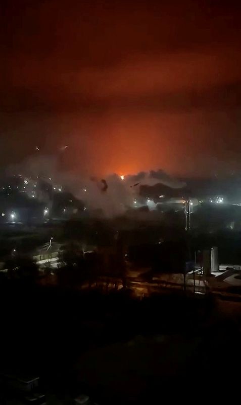 &copy; Reuters. Flames and smoke rise from an oil depot in Bryansk, Bryansk Region, Russia, released on December 11, 2024, in still image obtained from social media video. SOCIAL MEDIA/via REUTERS