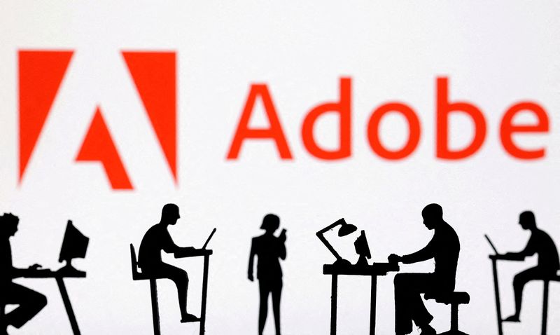 © Reuters. FILE PHOTO: Figurines with computers and smartphones are seen in front of Adobe logo in this illustration taken, February 19, 2024. REUTERS/Dado Ruvic/Illustration/File Photo