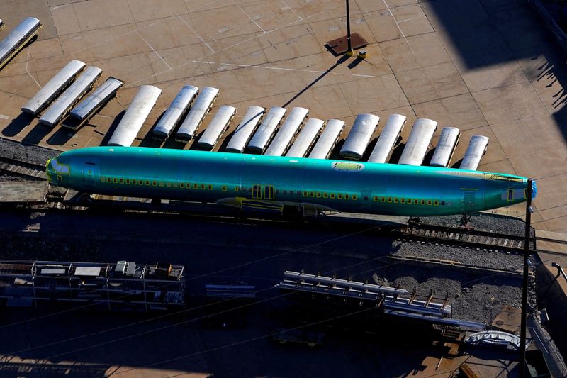 &copy; Reuters. An airplane fuselage bound for Boeing's 737 Max production facility awaits shipment on a rail siding at Spirit AeroSystems headquarters in Wichita, Kansas, U.S. December 10, 2024. REUTERS/Nick Oxford