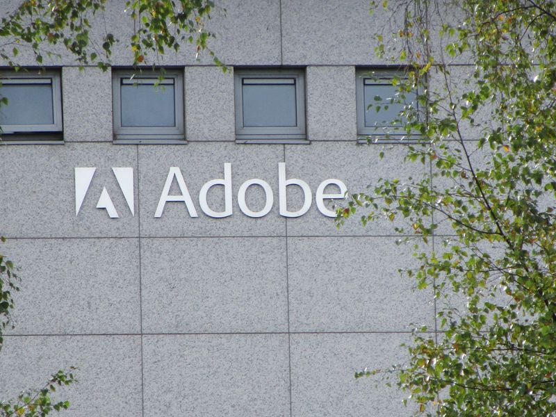 &copy; Reuters. A logo of Adobe Inc. is pictured at the company's office in Citywest Business Campus, Saggart, Ireland October 19, 2021. Picture taken October 19, 2021. REUTERS/ Tom Bergin/File Photo