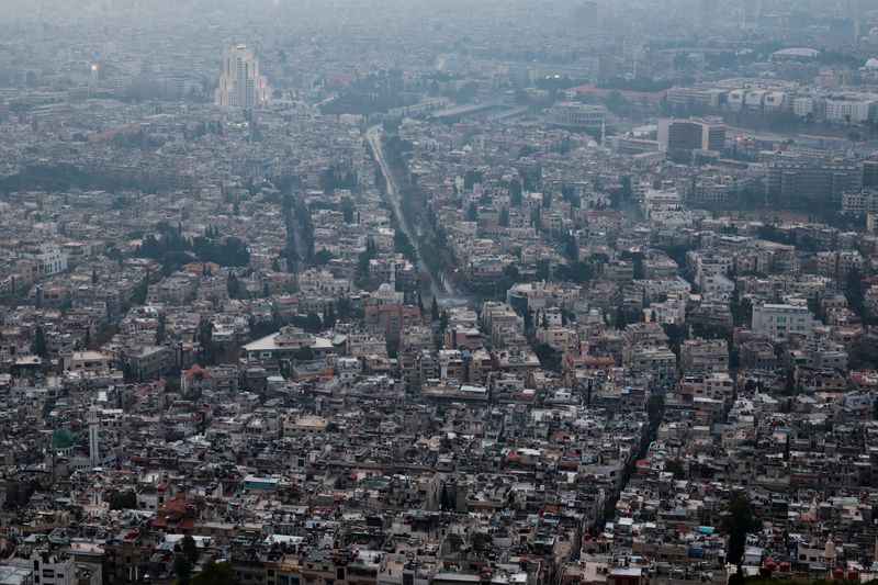 &copy; Reuters. Il sole sorge su Damasco a pochi giorni dalla conquista della capitale da parte dei ribelli, che hanno spodestato il presidente Bashar al-Assad a Damasco, Siria, 12 dicembre 2024. REUTERS/Ammar Awad