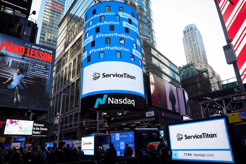 &copy; Reuters. A screen displays the company logo for ServiceTitan, during the company's IPO at the Nasdaq Market in Times Square in New York City, U.S., December 12, 2024.  REUTERS/Brendan McDermid