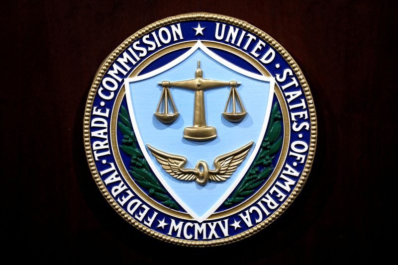 © Reuters. FILE PHOTO: Federal Trade Commission seal is seen at a news conference at FTC headquarters in Washington, U.S., July 24, 2019. REUTERS/Yuri Gripas/File Photo