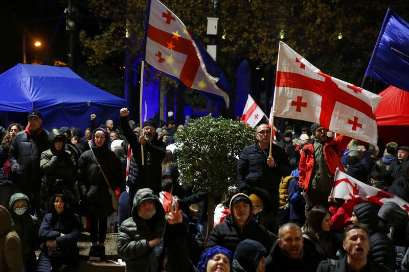 &copy; Reuters. FILE PHOTO: Supporters of Georgia's opposition parties hold a rally to protest against the results of a parliamentary election, which the opposition say were rigged, on the eve of the new parliament's first session in Tbilisi, Georgia November 24, 2024. R