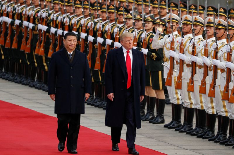 © Reuters. FILE PHOTO: U.S. President Donald Trump takes part in a welcoming ceremony with China's President Xi Jinping in Beijing, China, November 9, 2017. REUTERS/Damir Sagolj/File Photo