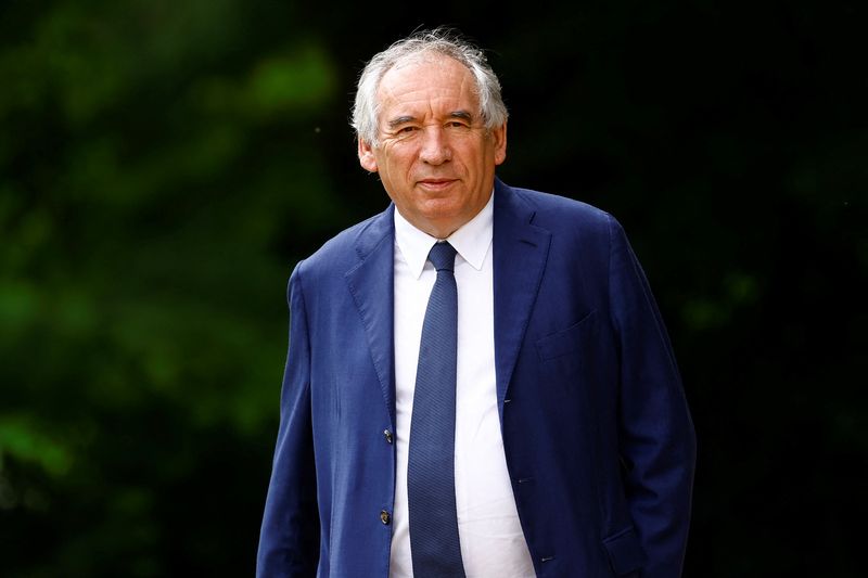 &copy; Reuters. FILE PHOTO: Francois Bayrou, leader of French centrist party MoDem (Mouvement Democrate - Democratic Movement ) walks outside the Elysee Palace on the day President Emmanuel Macron met party leaders for talks with a view to discuss appointing a new prime 